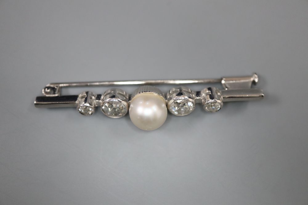 A white metal single stone cultured pearl and four stone diamond set bar brooch, 48mm, gross 4.9 grams.